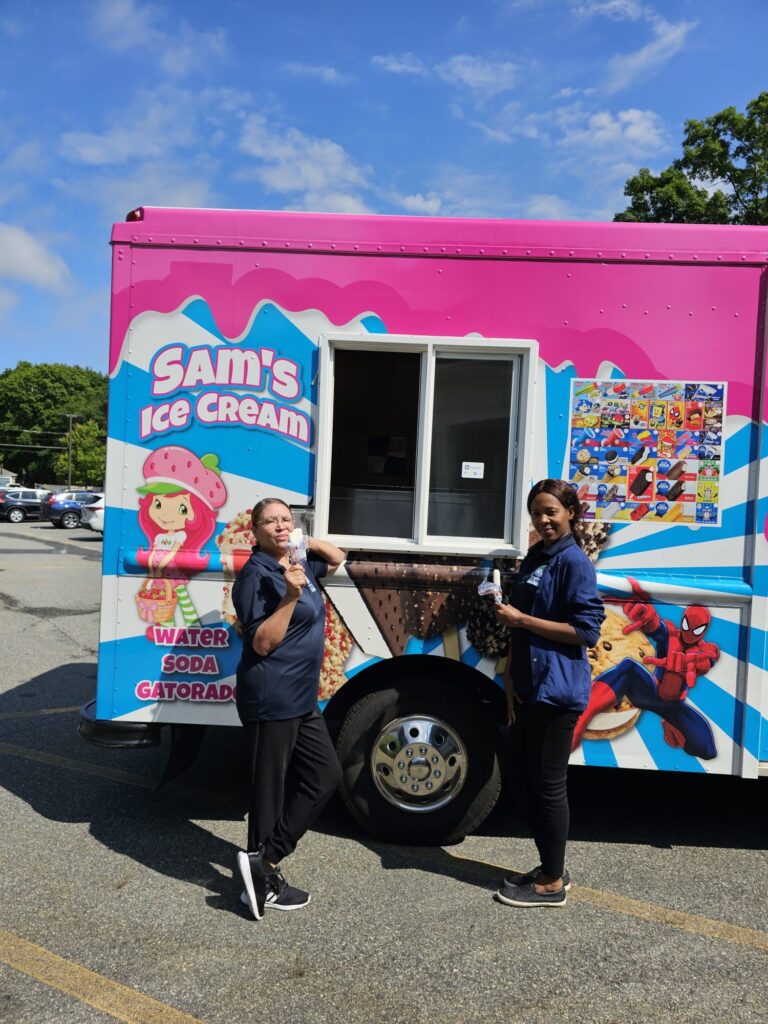 Two Women Enjoying and Eat Sam’s Ice Cream 